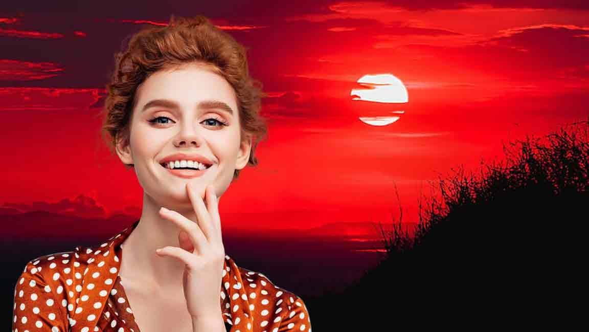 replace-background-behind-hair Hair cutout placed over a red sunset background after the original background was removed.