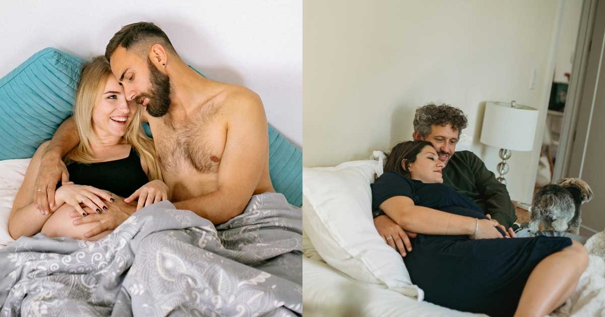 Expecting couple lying and sitting together on a bed, holding the baby bump during a relaxed indoor maternity photoshoot
