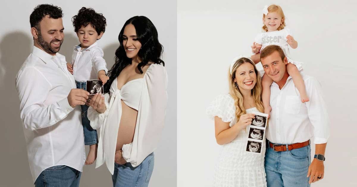 Family posing with children holding ultrasound photo props during an indoor maternity photoshoot
