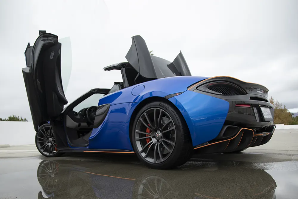 blue-mclaren-supercar-raw-sample-photo Blue McLaren supercar with butterfly doors open, RAW sample photo